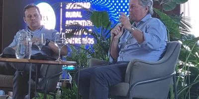 El economista Fauto Spotorno y Marcos Pereda Vicepresidente de SRA, en el intercambio de ideas