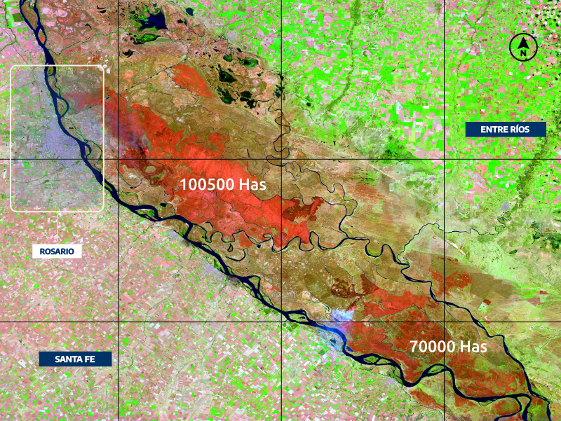 Se observa en color rojo las áreas quemadas, y en rojo más intenso los frentes de fuego. En color gris-celeste se ven las columnas de humo y gases producidos por el incendio).